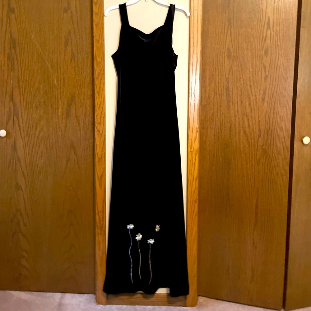 Plush black velvet evening dress with silver embroidered flowers.